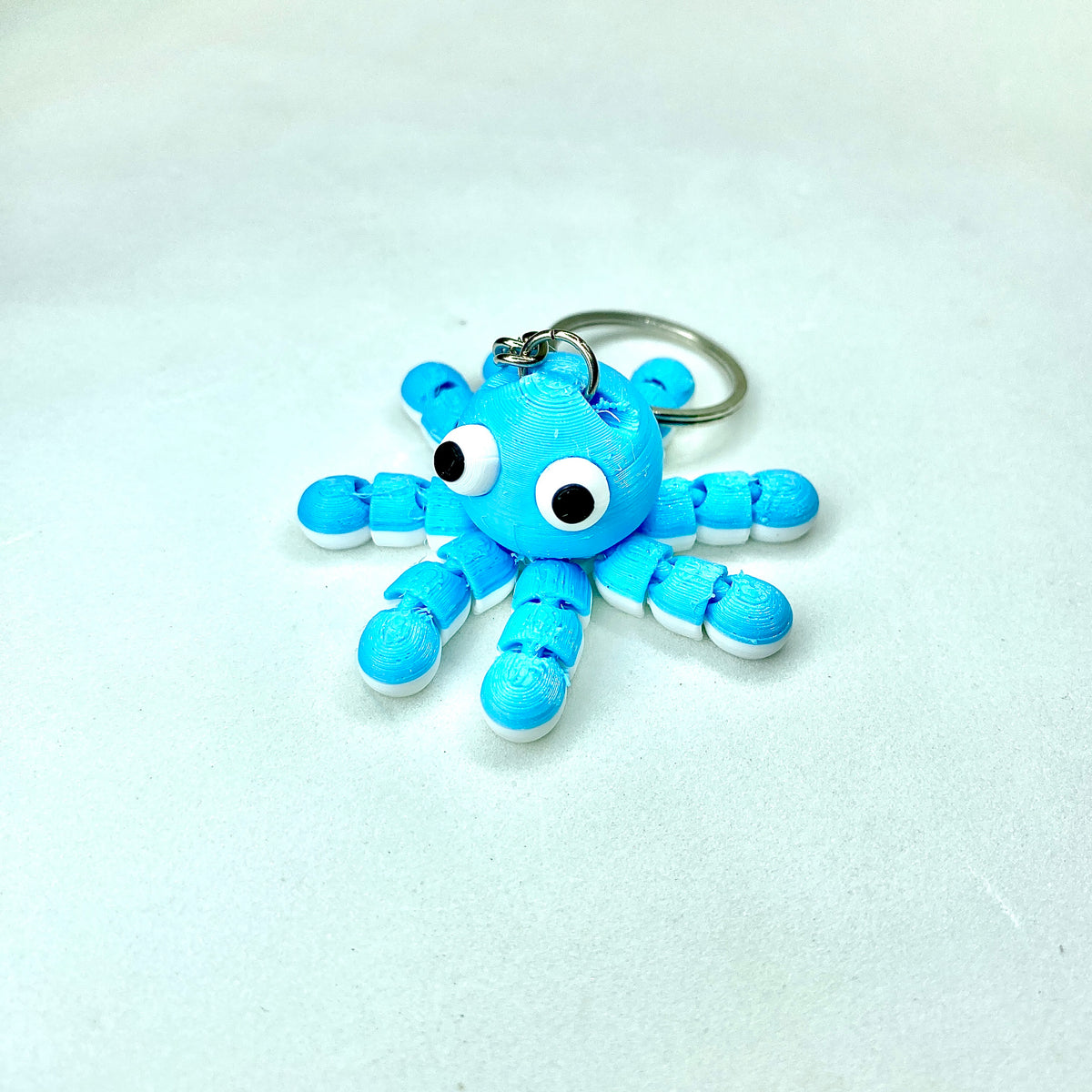 Chaveiro Polvo Articulado 3D – Mini Polvo com Tentáculos Móveis