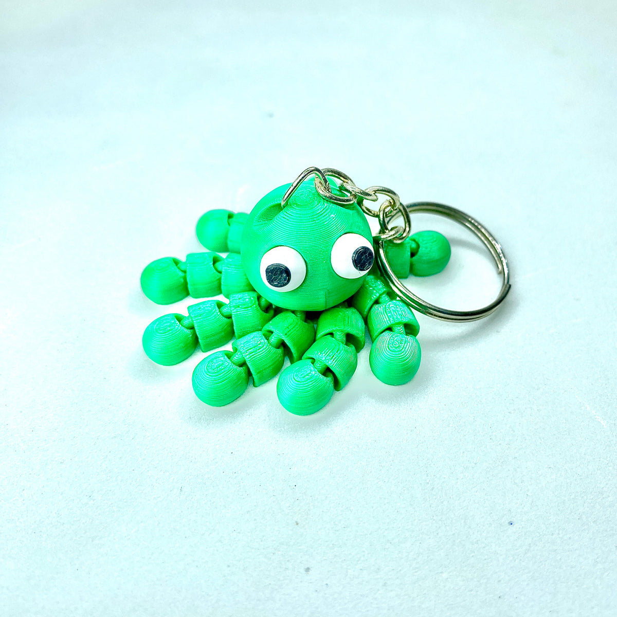 Chaveiro Polvo Articulado 3D – Mini Polvo com Tentáculos Móveis